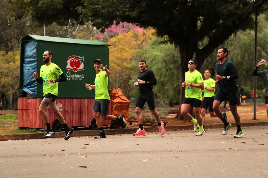 BORA group running together in neon green shirts